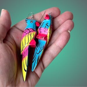 Large lacquered tropical bird dangle earrings glow